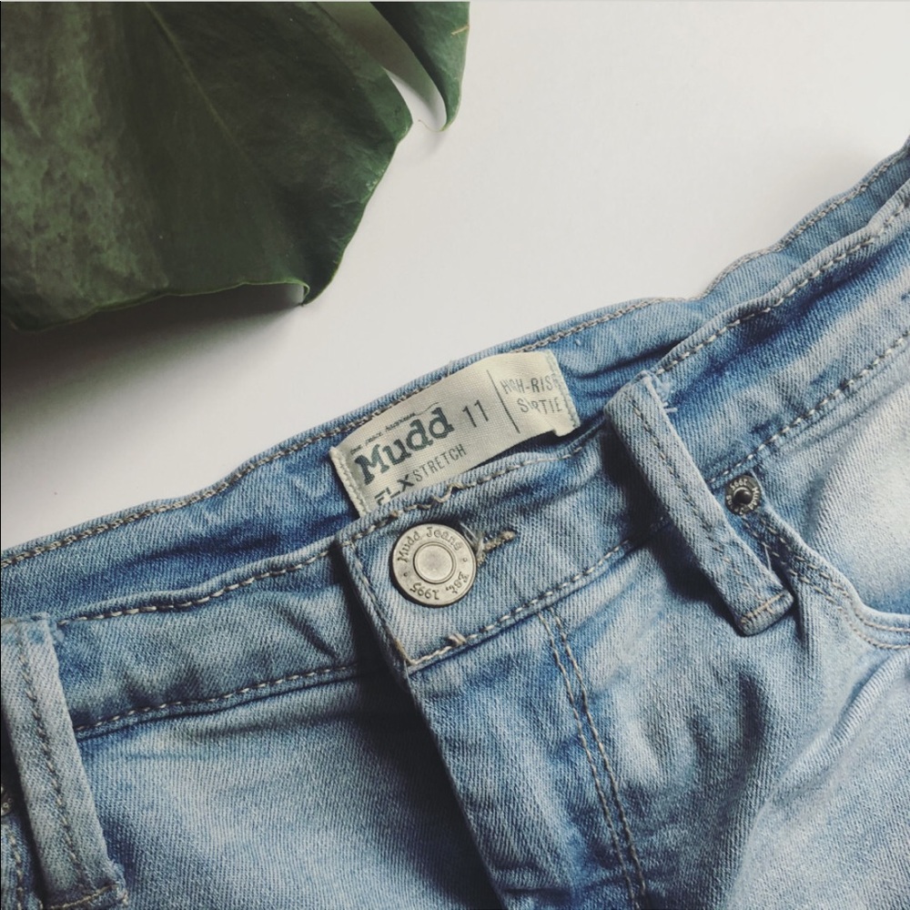 Faded blue distressed jean shorts
